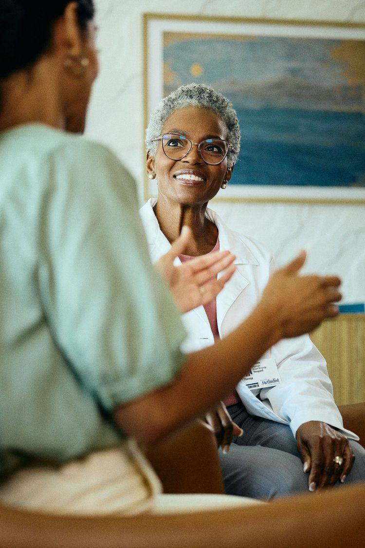 Canadian physician speaking with a patient